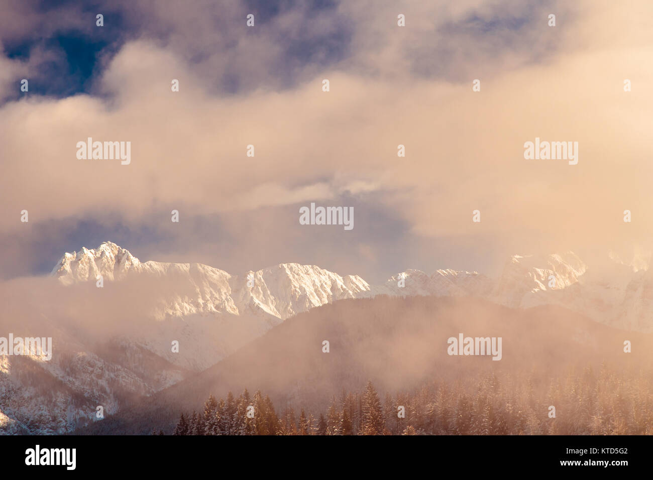 Clouds surrounding the italian alps after the snowfall Stock Photo - Alamy