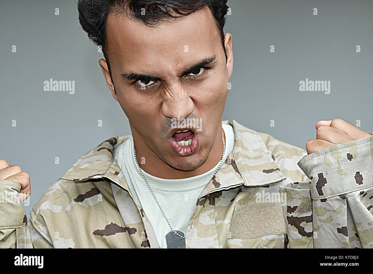 Stressed Colombian Male Soldier Stock Photo