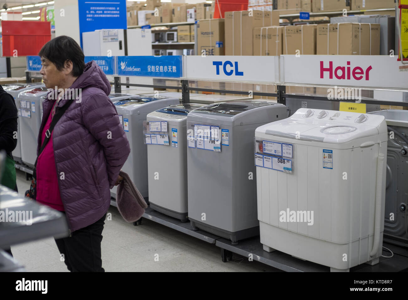 Chinese domestic brand washer machines are on sale in a WalMart