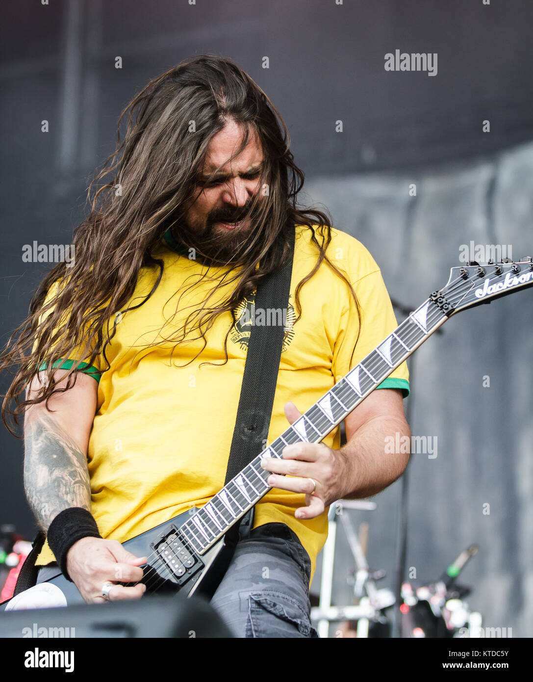 The Brazilian death and thrash metal band Sepultura performs a live concert at the Scandinavian heavy metal festival Copenhell 2014 in Copenhagen. Here guitarist Andreas Rudolf Kisser is seen live on stage. Denmark 12/06 2014. Stock Photo
