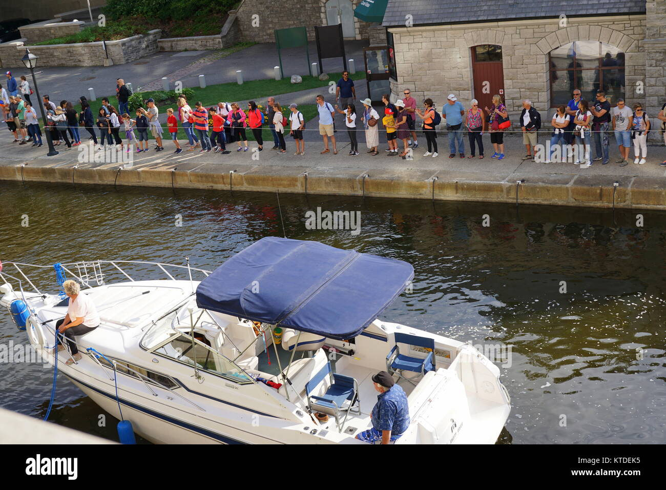 A crowd of visitors at the Rideau Canal, a national historic site in Ottawa, Canada Stock Photo