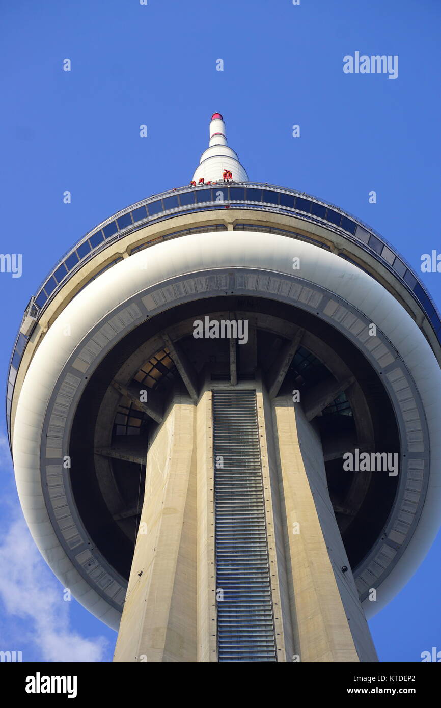 Tourist around the circumference of the roof at the CN Tower doing the EdgeWalk, Toronto, Ontario, Canada Stock Photo
