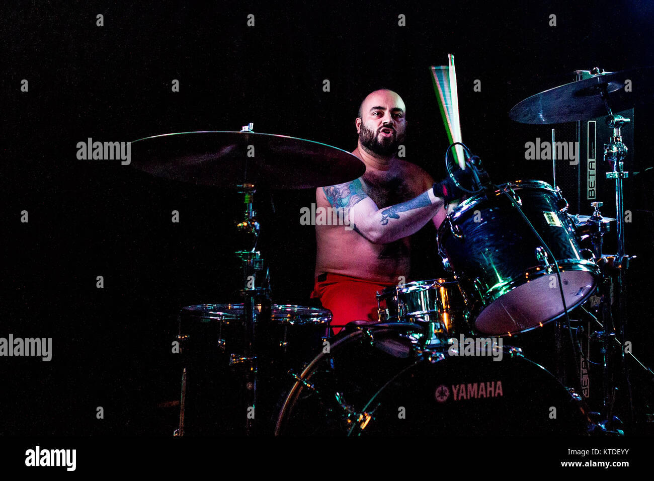 The American stoner and sludge metal band Torche performs a live concert at BETA in Copenhagen. Here drummer Rick Smith is seen live on stage. Denmark, 08/11 2015. Stock Photo