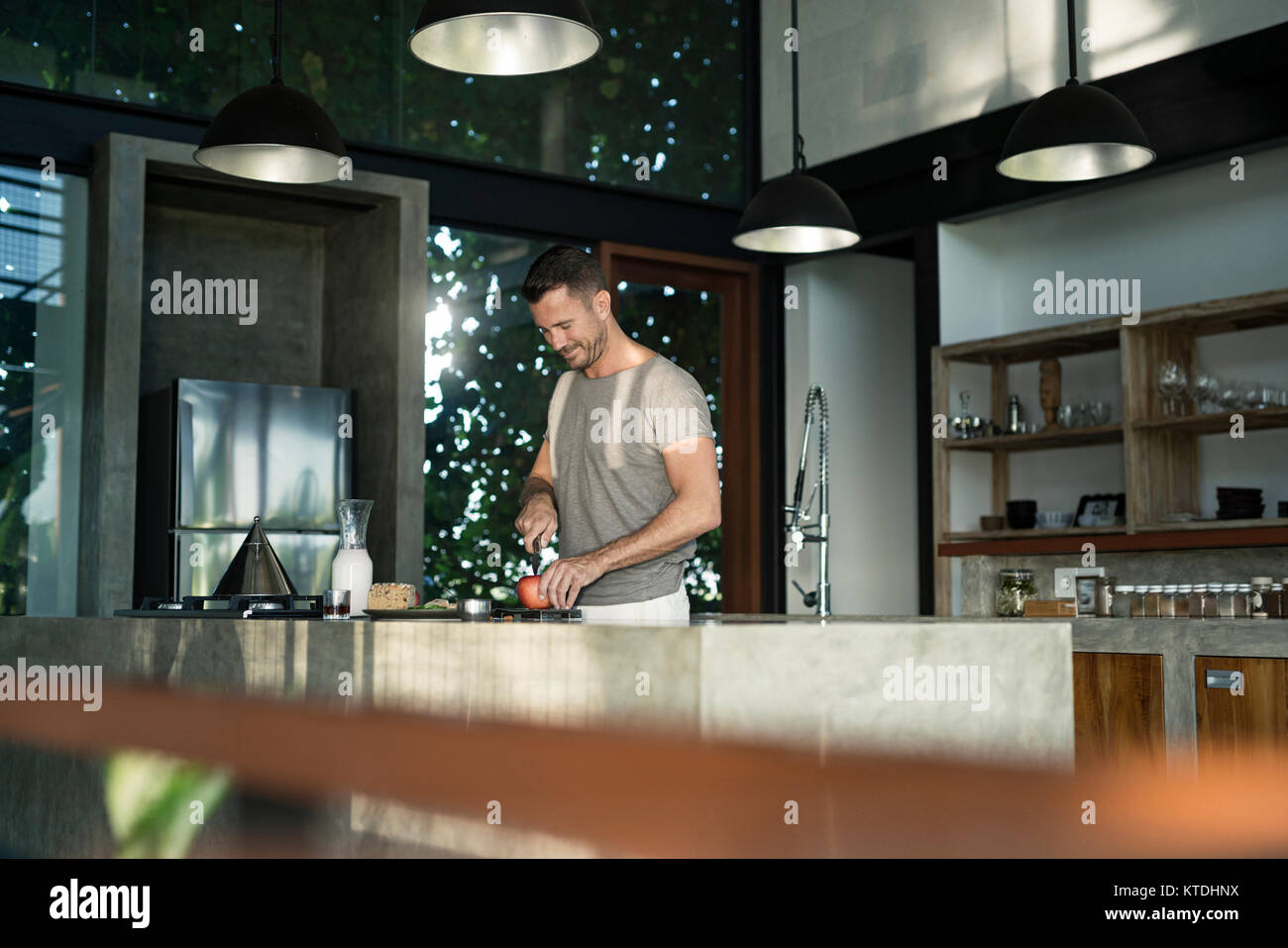 Man In Kitchen Person in kitchen of villa hi-res stock photography and images - Alamy