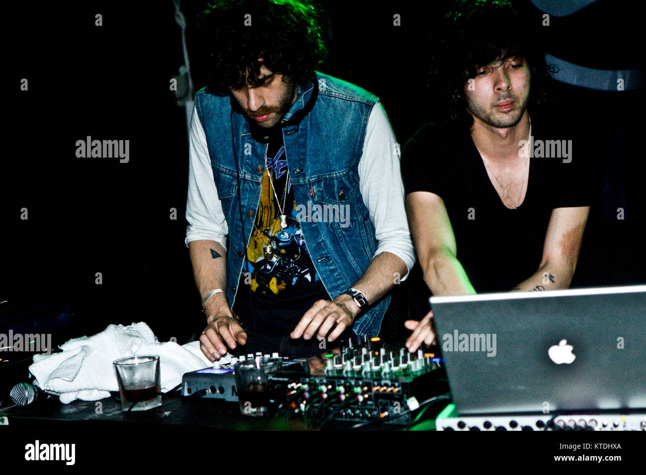 The electronic music duo Justice (stylised as Jus†ice) performs a live