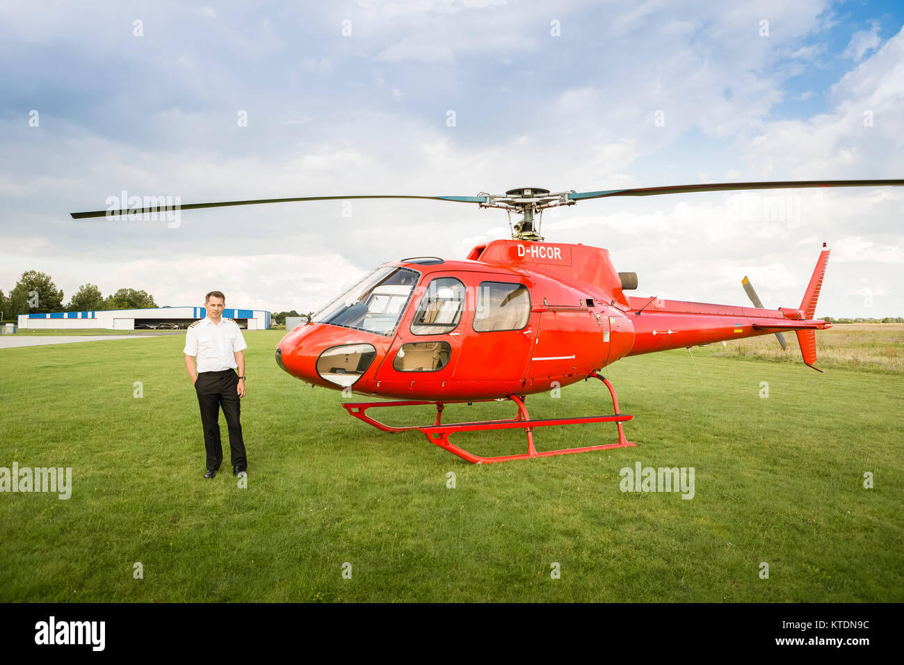 Red colour helicopter hires stock photography and images Alamy