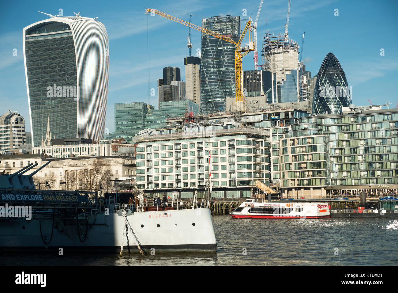 The City of London Skyline with HMS Belfast and the River Thames London England United Kingdom UK Stock Photo