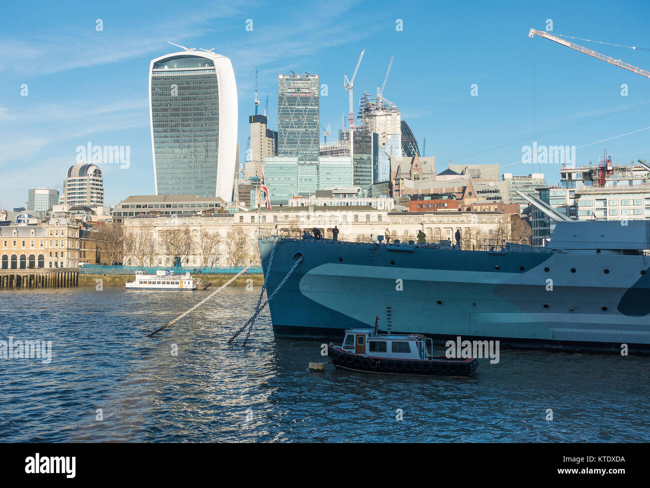 The City of London Skyline with HMS Belfast and the River Thames London England United Kingdom UK Stock Photo