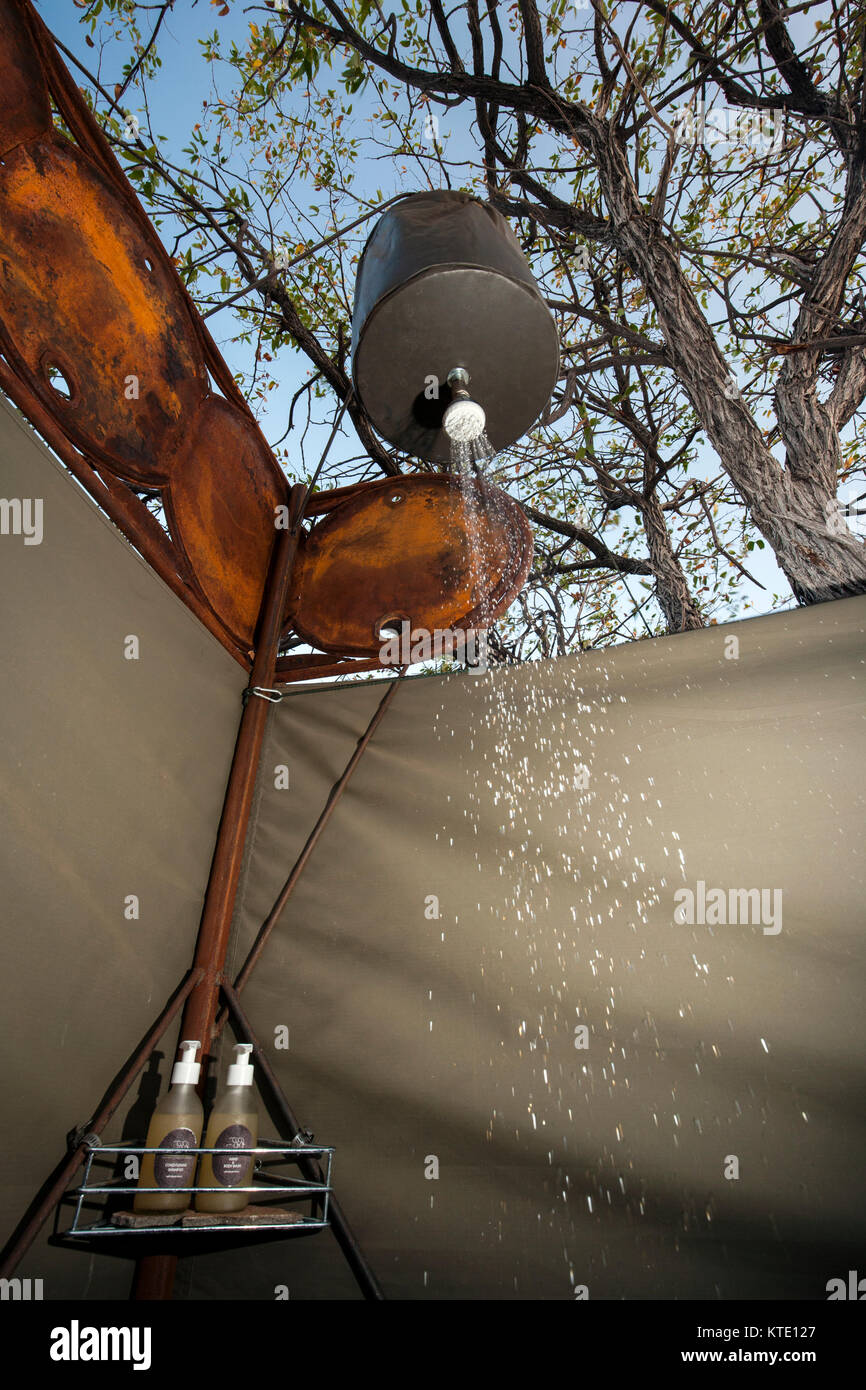 Demonstration: How a bucket makes a great shower in the Kalahari bush 
