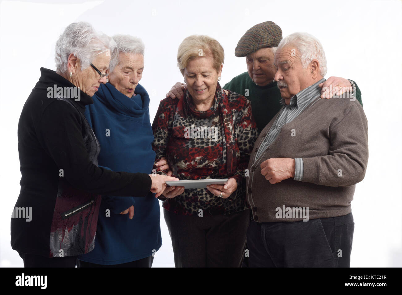group of older person with a digital tablet Stock Photo