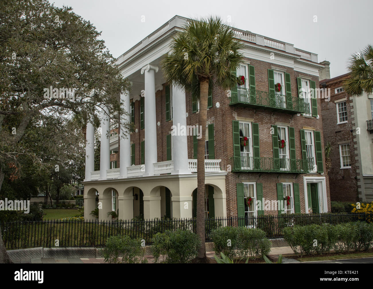 Traditional Charleston single house with long sideways veranda Stock Photo
