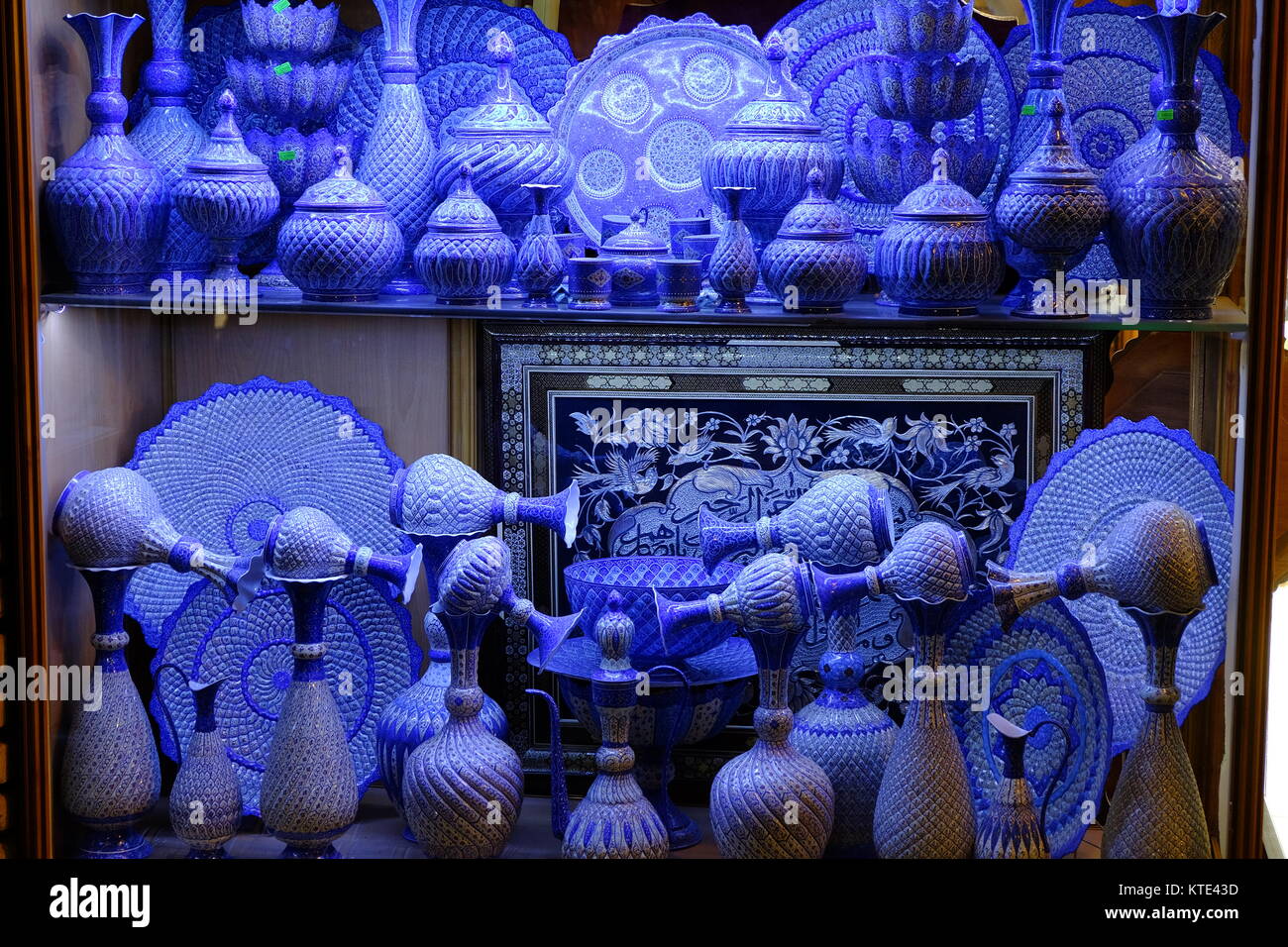 The Art of Minakari with the azure blue enamelling is a unique craft from Isfahan. Iran Stock Photo