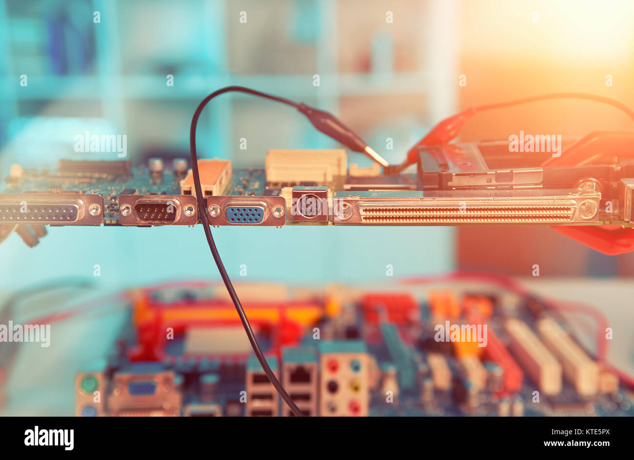 Closeup on electronic board in hardware repair shop, blurred and toned  image, electronics background Stock Photo - Alamy