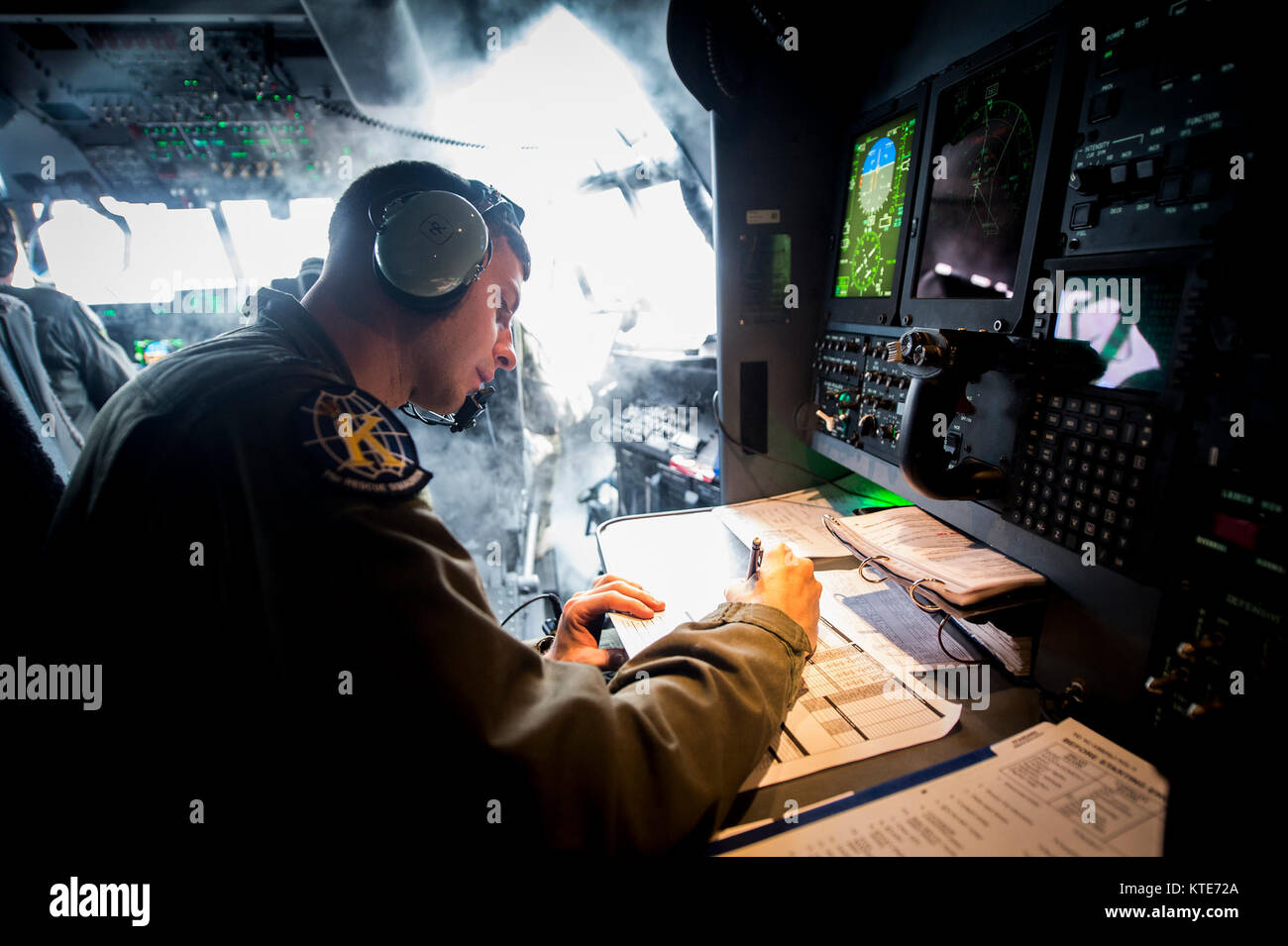 1st Lt. David Schmitt, 71st Rescue Squadron combat systems officer, during  an HC-130J Combat King II civic leader orientation flight, Dec. 20, 2017,  in the skies over Valdosta, Ga. The Honorary Commander, image size:1300x955