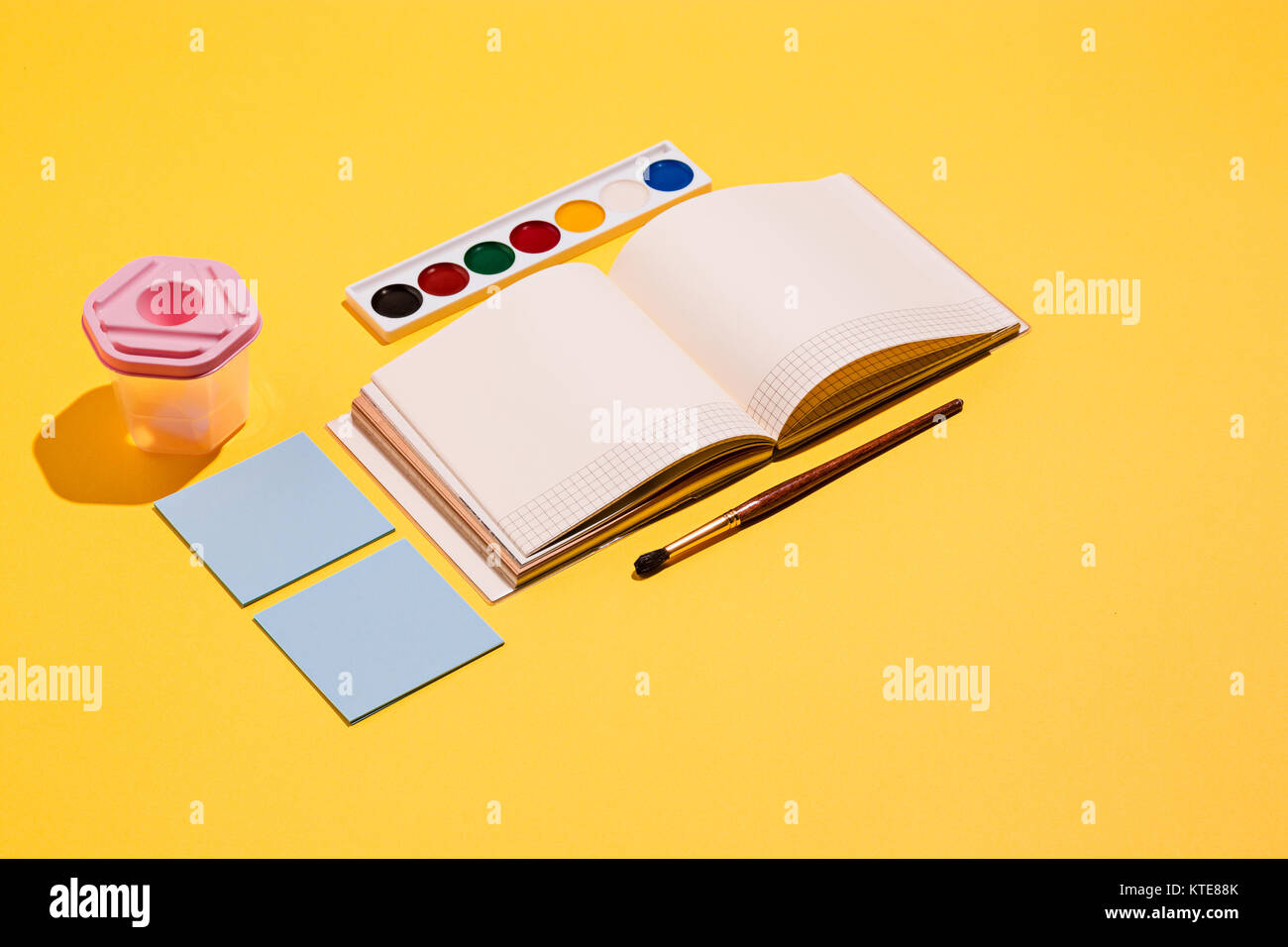 Artistic tools brushes, watercolor paint, notebook Stock Photo Alamy