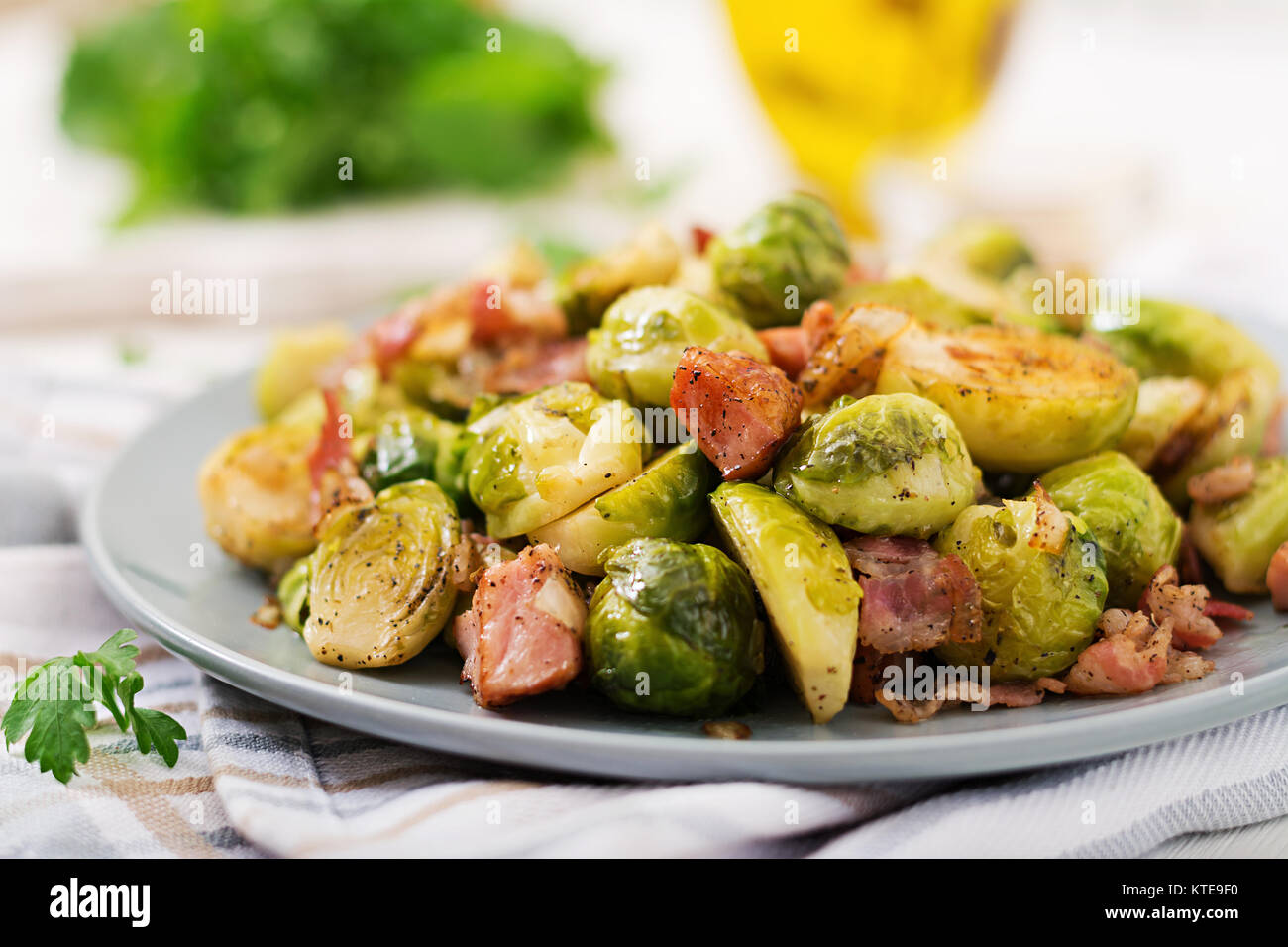 Brussels sprouts. Roasted Brussels sprouts with bacon. Delicious lunch. Stock Photo
