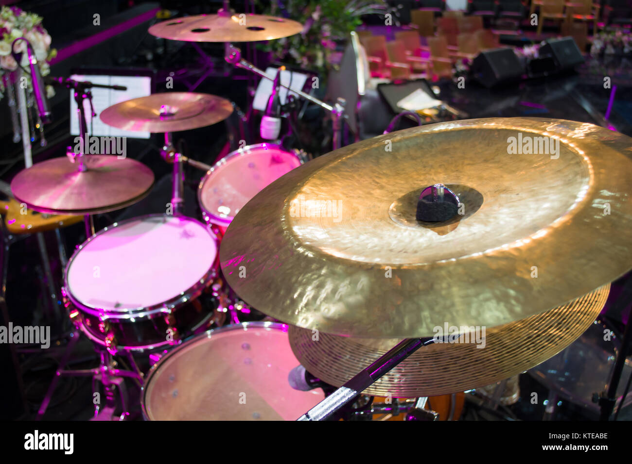 drum set and music notes in concert studio Stock Photo Alamy