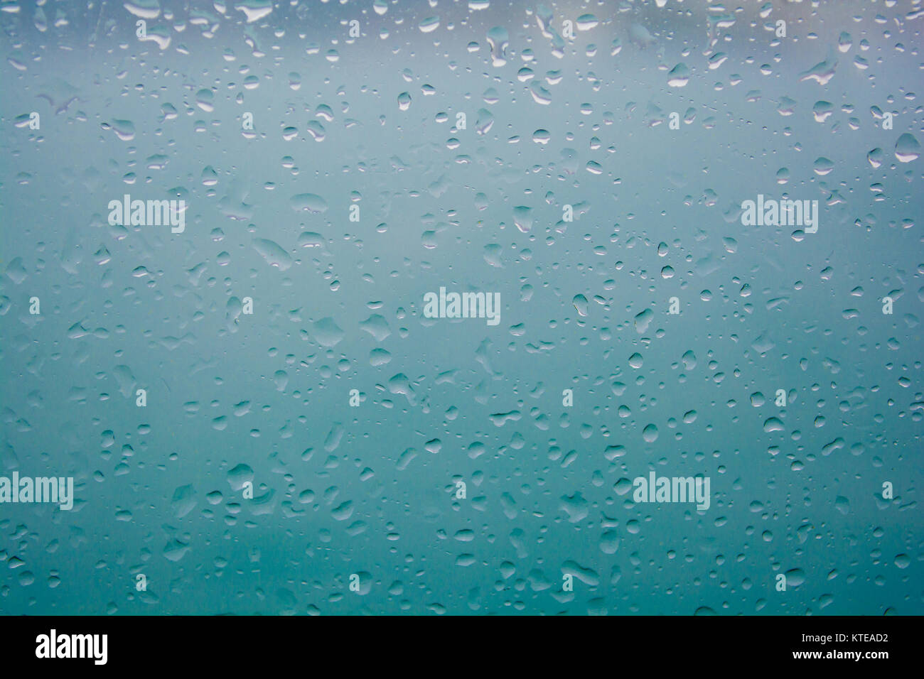 water drops on blue background Stock Photo - Alamy