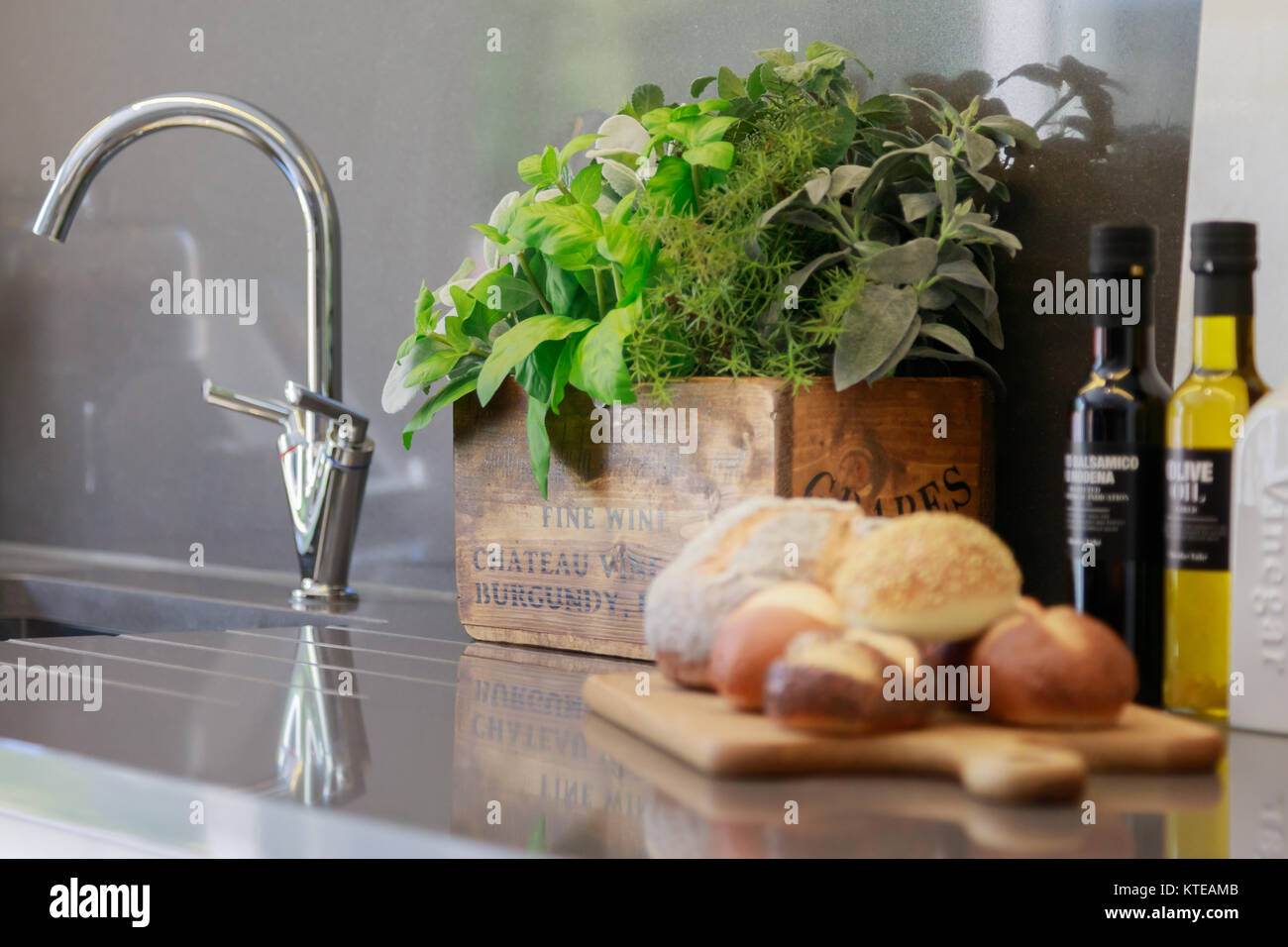 Kitchen worktop and sink in modern house. UK Stock Photo