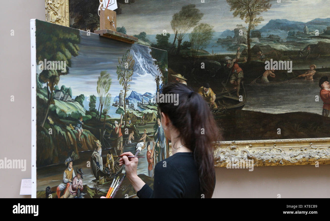 PARIS, FRANCE, MARCH 27, 2017 : copyist painter at work in the great ...
