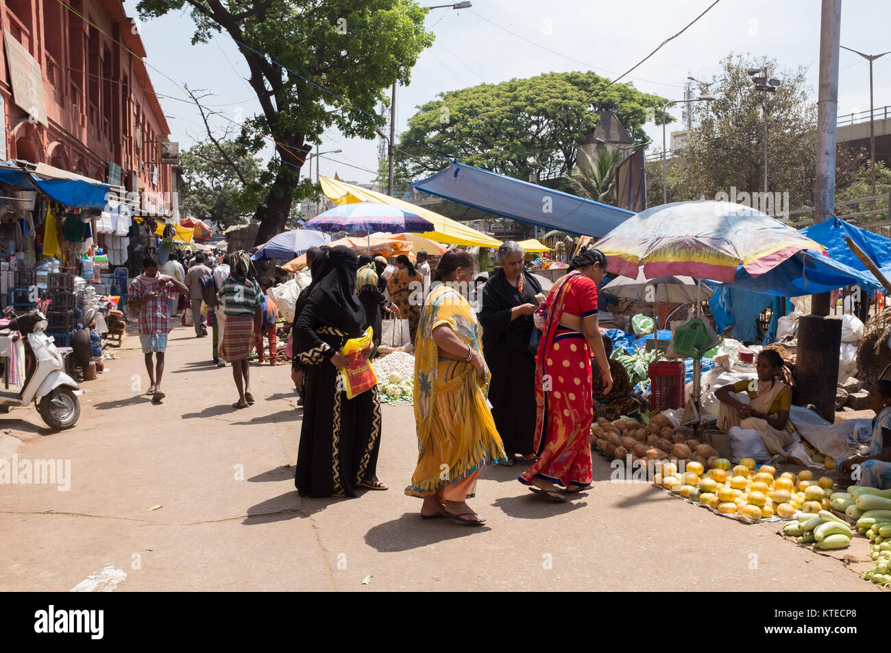 Women shopping in a local street market at Sri Krishna Rajendra Market in Bangalore, Bengaluru, Karnataka, India, Asia. Stock Photo