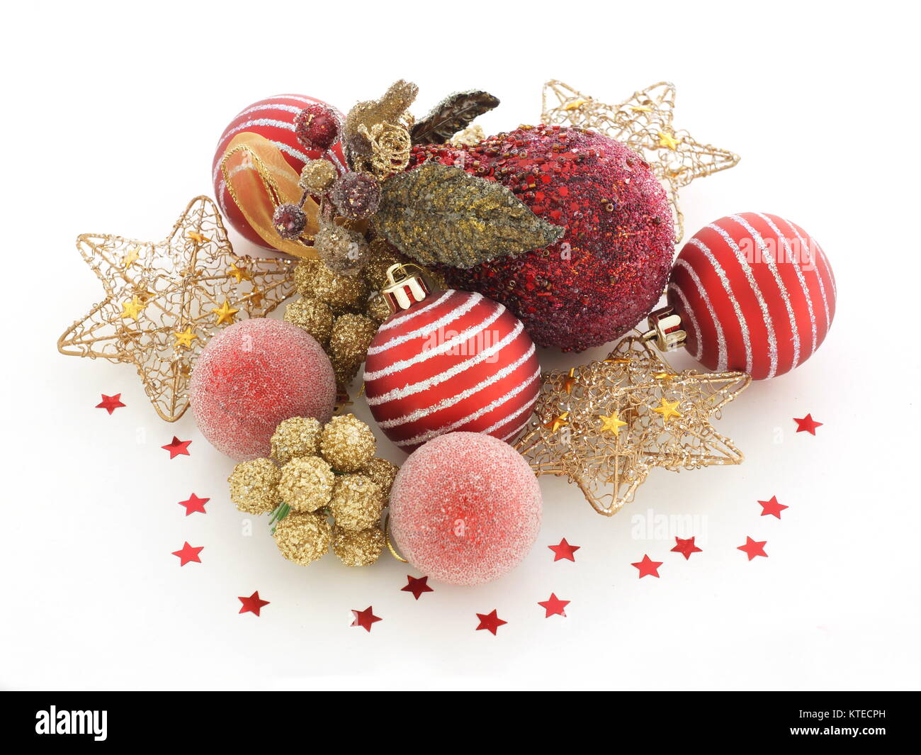 Red and gold Christmas decorations on white background Stock Photo