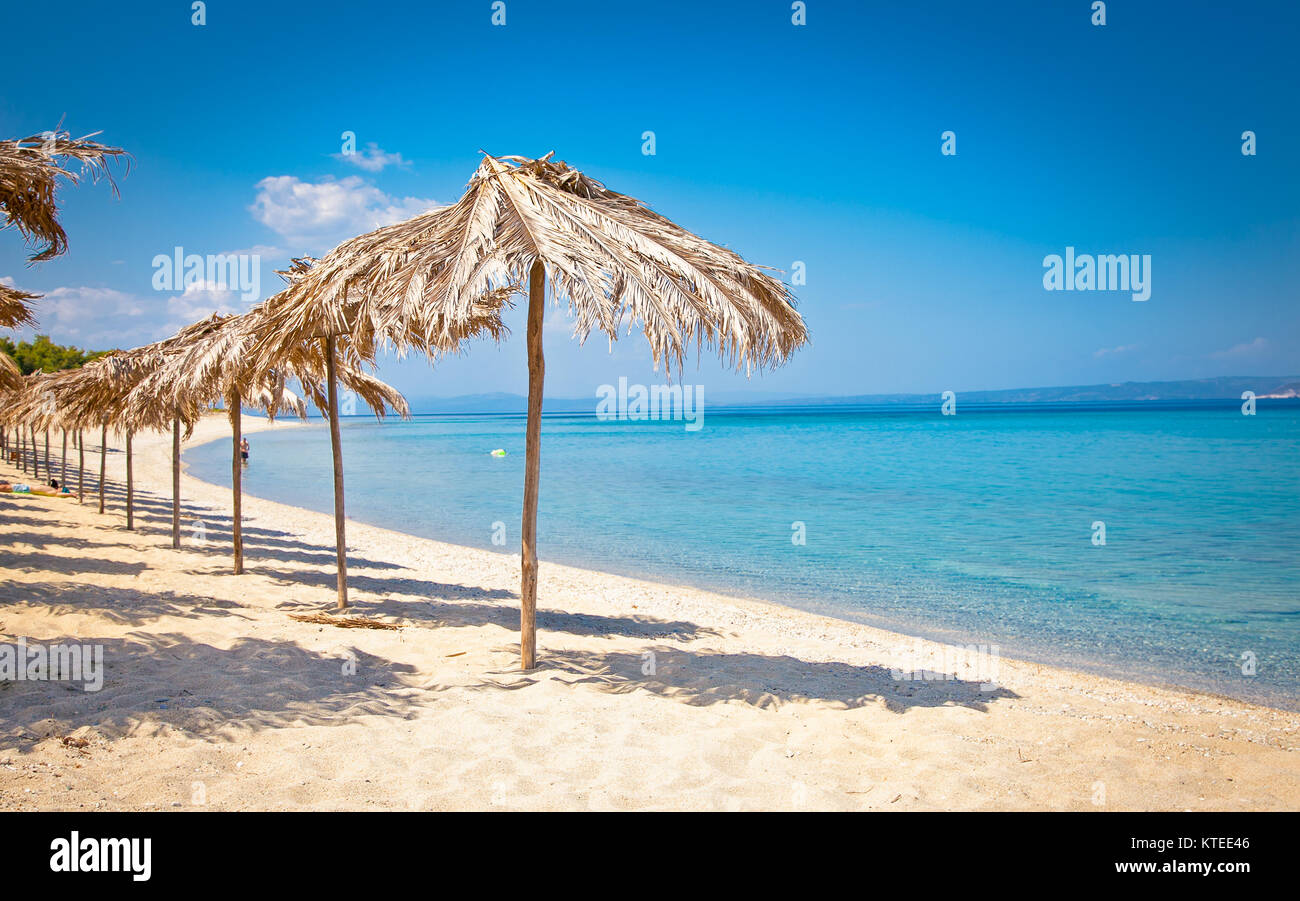 Beautiful Paradiso sand beach on Akra Glarokavos, Kassandra peninsula, Hakidiki, Greece. Stock Photo