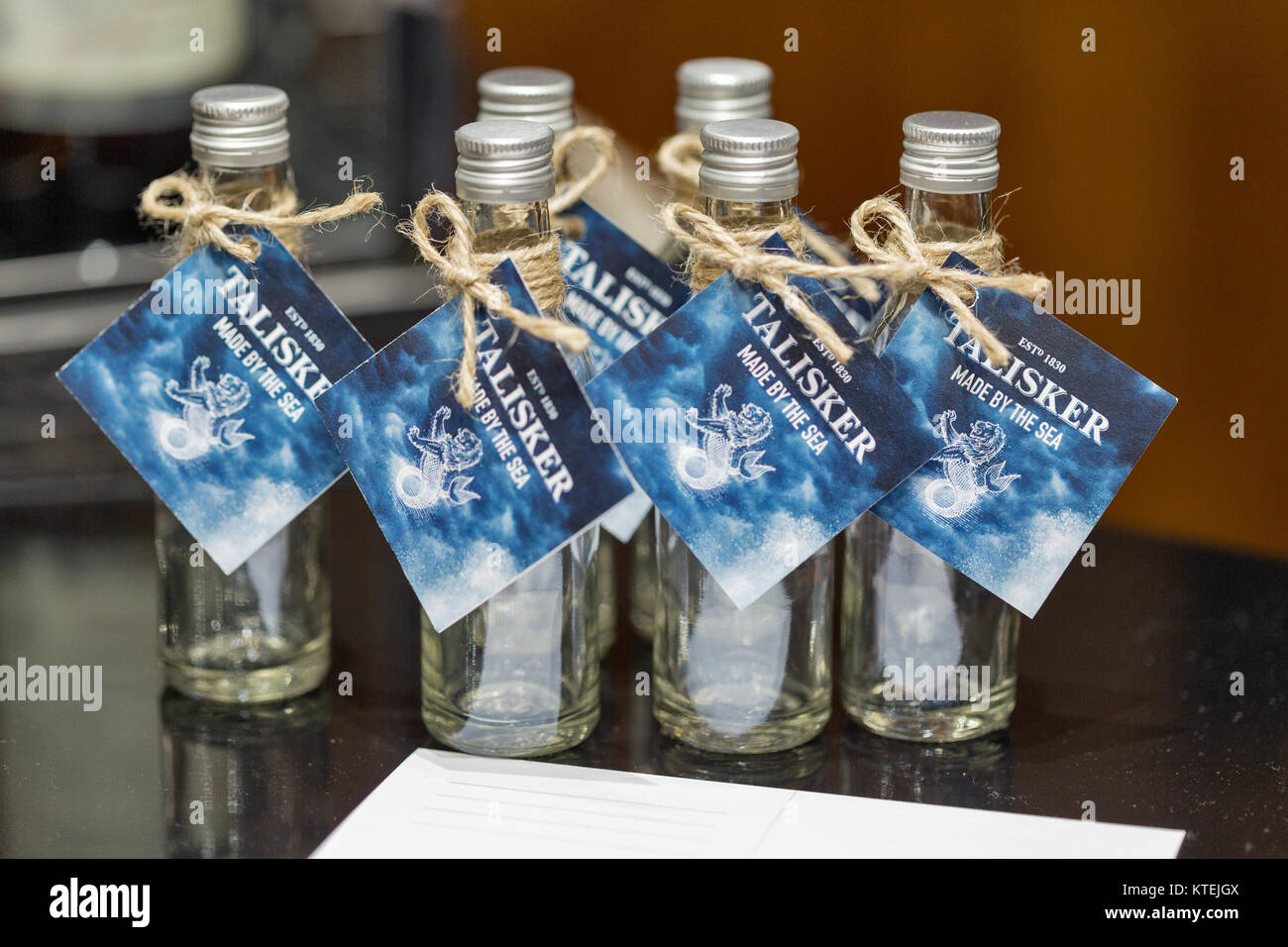 KIEV, UKRAINE - NOVEMBER 25, 2017: Talisker Island Single Malt Scotch Whisky small bottles closeup at 3rd Ukrainian Whisky Dram Festival in Parkovy Ex Stock Photo
