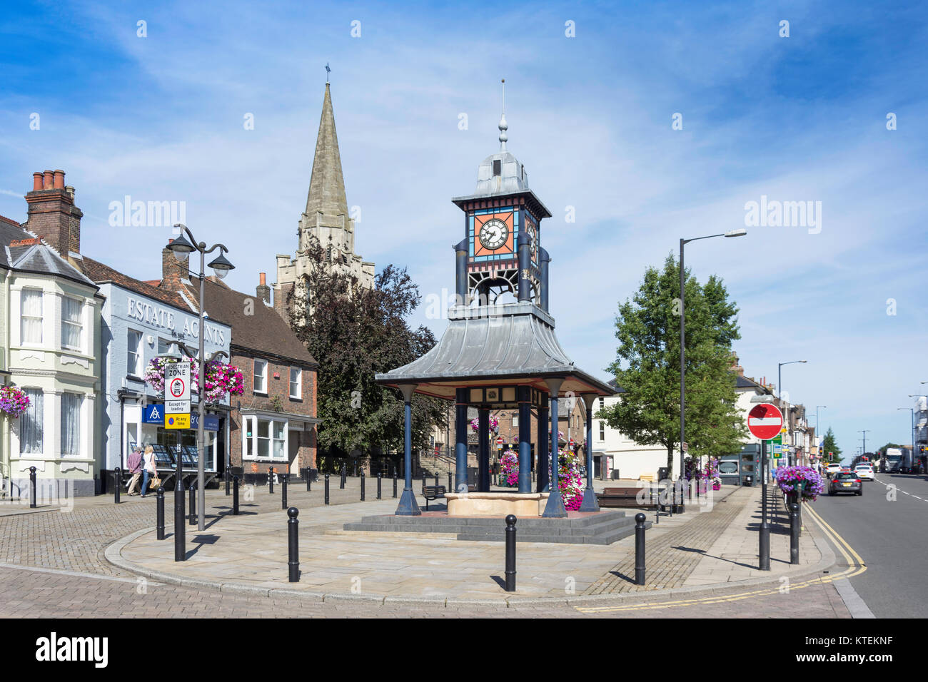 Market Clock and Methodist Church spire, Ashton Square, Dunstable, Bedfordshire, England, United Kingdom Stock Photo