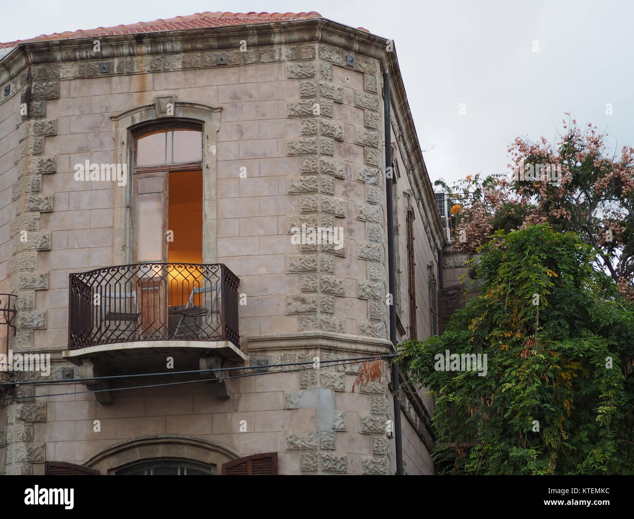 old classic residence house with stone walls roof tiles balcony and ...