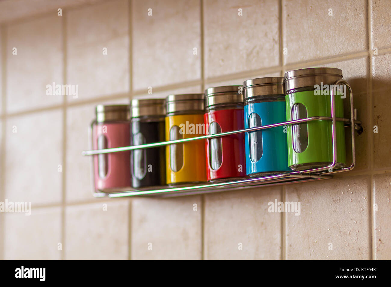 Colorful spice salt and pepper containers in kitchen Stock Photo Alamy