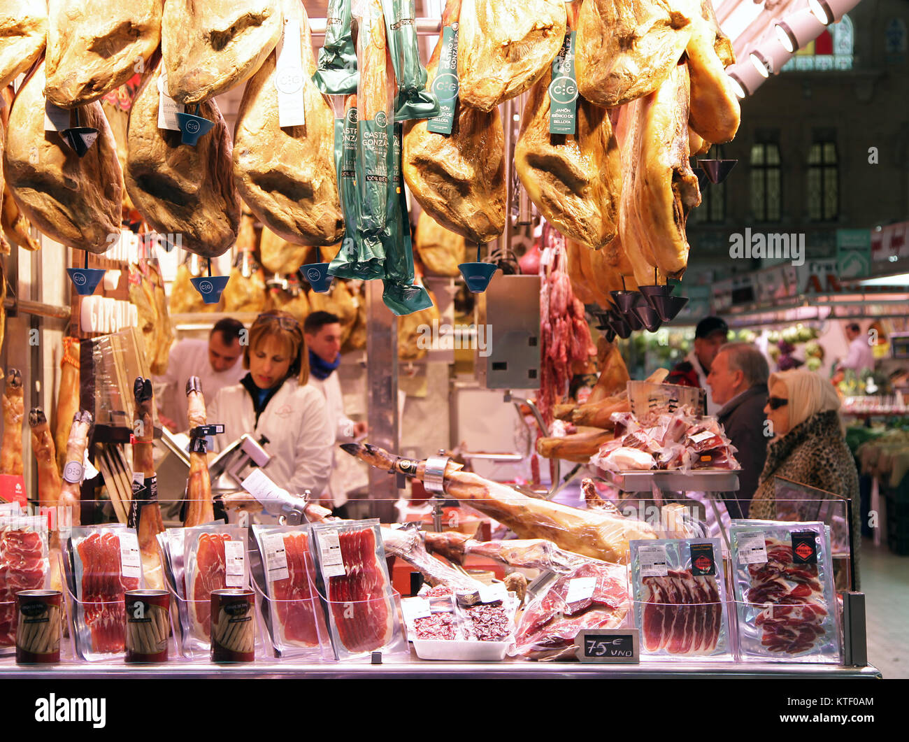 Spanish hams.Jamón Ibérico Pata negra pigs Mercat Central Valencia Spain Stock Photo