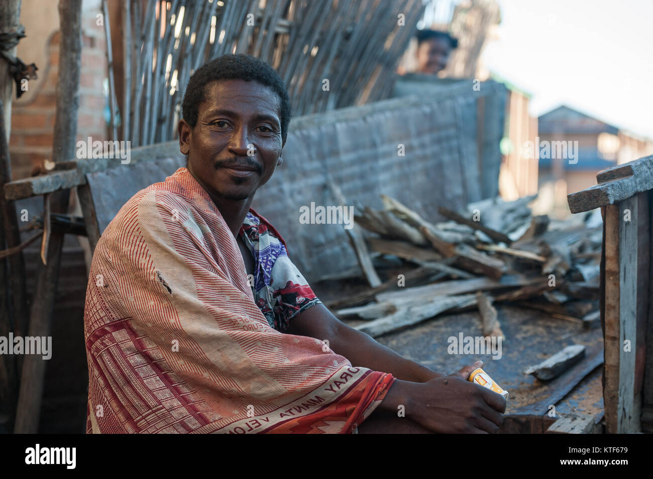 Relaxing at dusk after collecting wood in Ankavandra, Madagascar Stock Photo