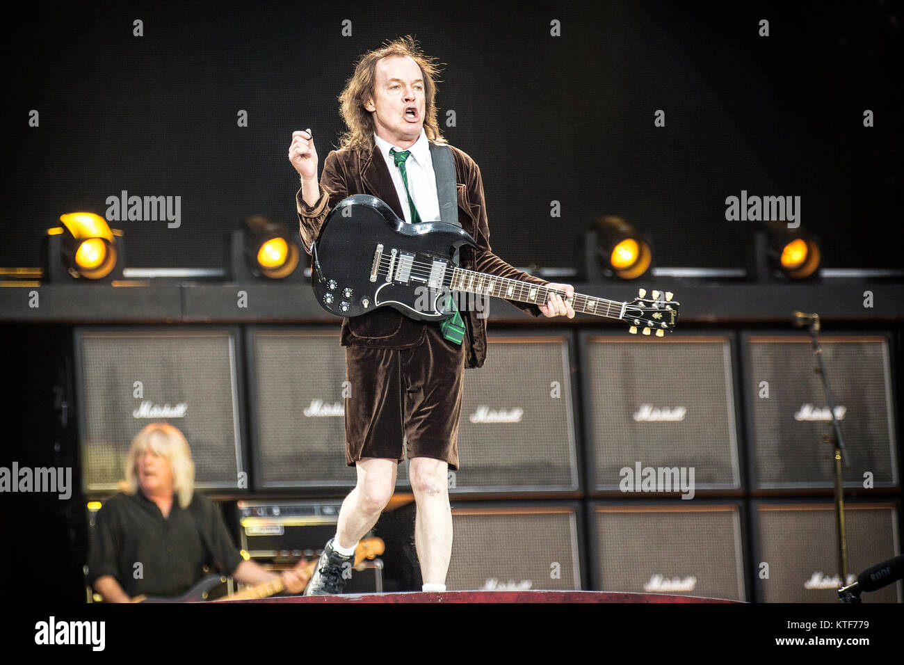 The Australian rock band AC/DC performs a live concert at Valle Hovin Stadion in Oslo as part of the Rock or Bust World 2015 Tour. Here musician and guitarist Angus Young is seen live on stage. Norway, 17/07 2015. Stock Photo