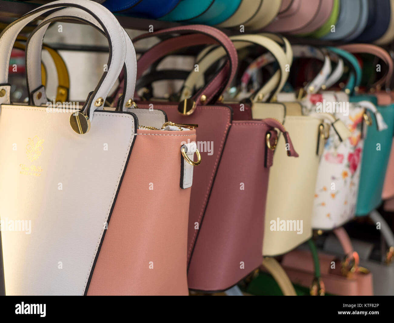 Pile of used worn secondhand bags handbags for sale Stock Photo - Alamy