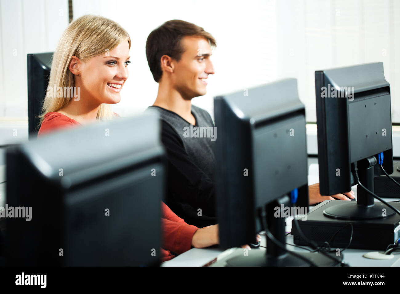 Students learning in computer lab Stock Photo - Alamy
