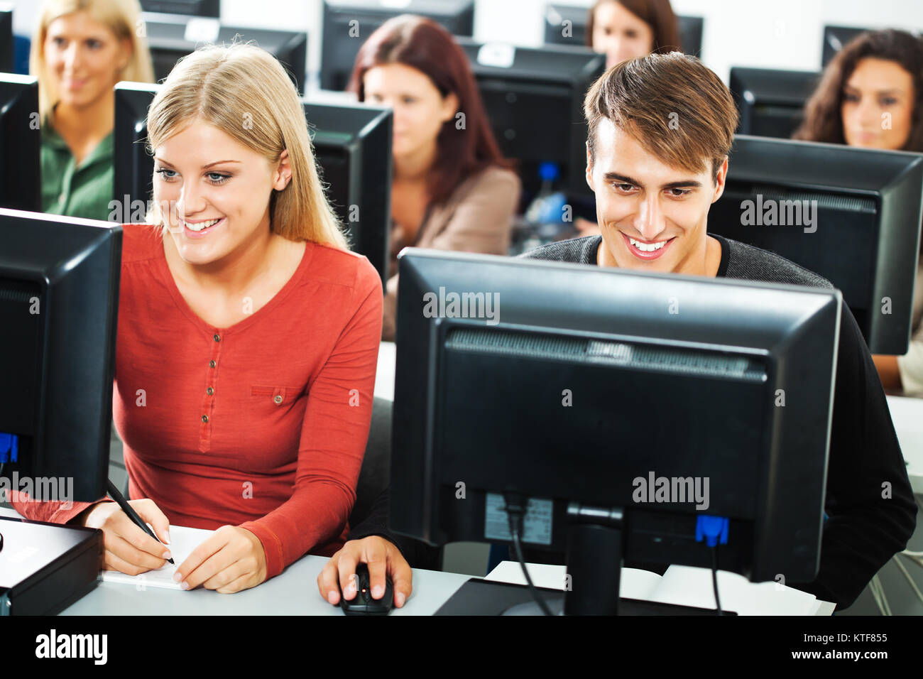 Students learning in computer lab Stock Photo - Alamy