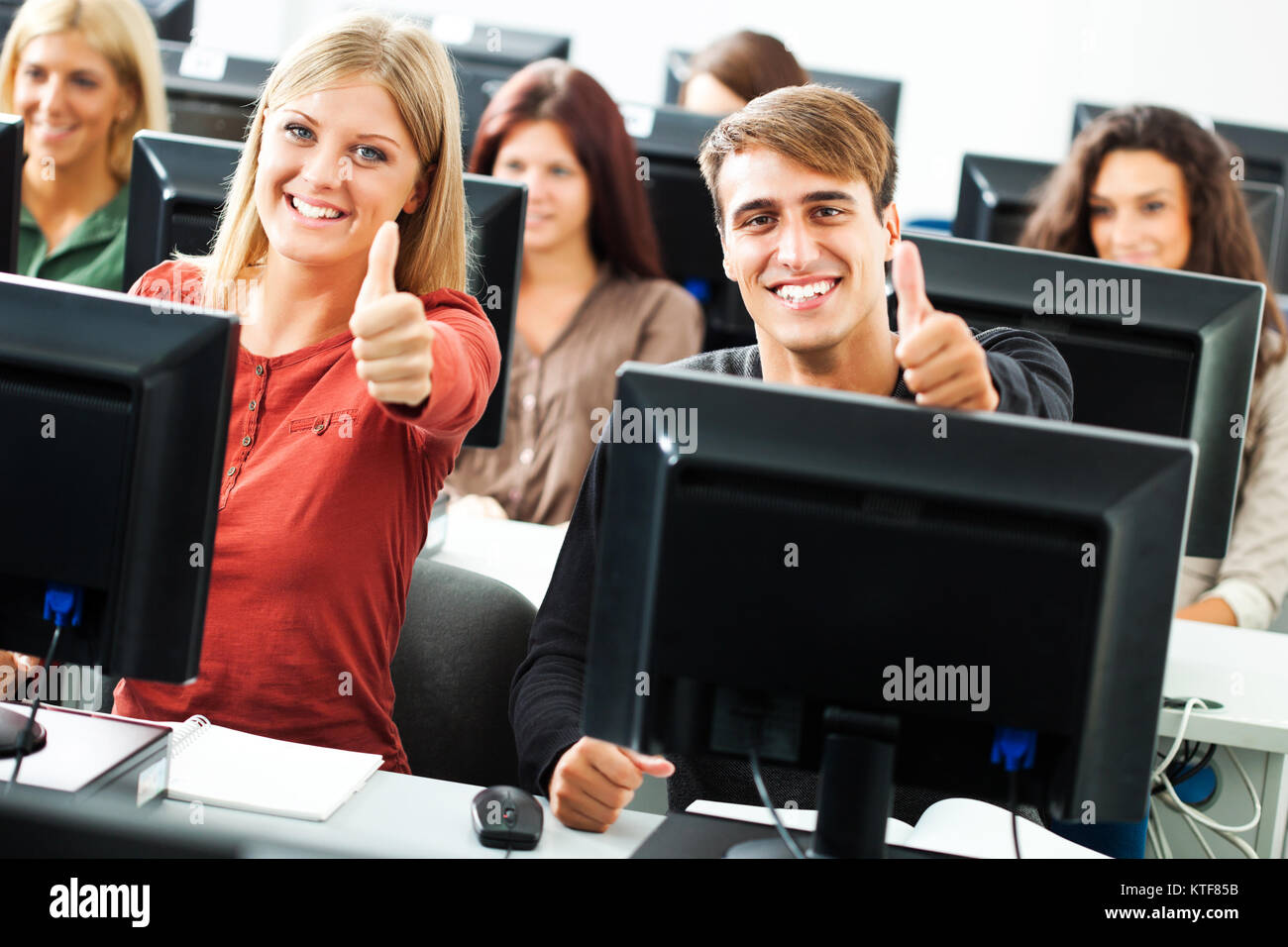 Students learning in computer lab Stock Photo - Alamy