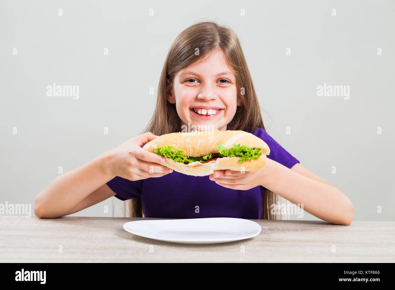 A Young Stylish Girl Smiles Gently and Shows Her Thumb Up, Meaning that Her  Sandwich is Very Tasty, and You Should Try Stock Photo - Image of  lifestyle, american: 118096764