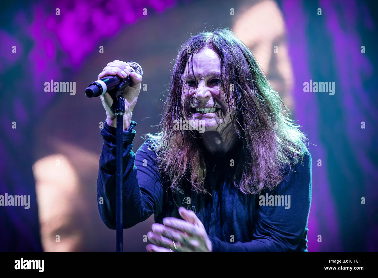 The English rock band Black Sabbath performs a live concert at Telenor Arena in Oslo. Here singer and TV-celebrity Ozzy Osbourne is seen live on stage. Norway, 24/11 2013. Stock Photo