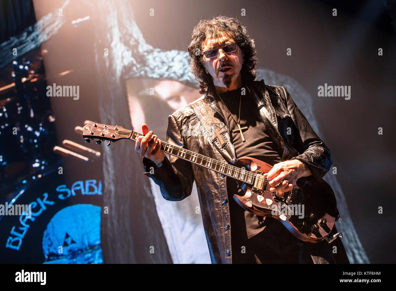 The English rock band Black Sabbath performs a live concert at Telenor Arena in Oslo. Here musician Tony Iommi on guitar is seen live on stage. Norway, 24/11 2013. Stock Photo