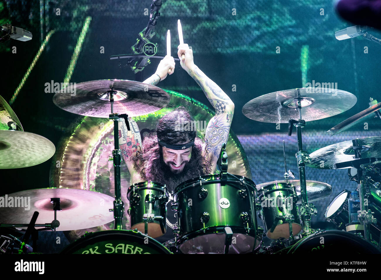 The English rock band Black Sabbath performs a live concert at Telenor Arena in Oslo. Here musician Tommy Clufetos on drums is seen live on stage. Norway, 24/11 2013. Stock Photo