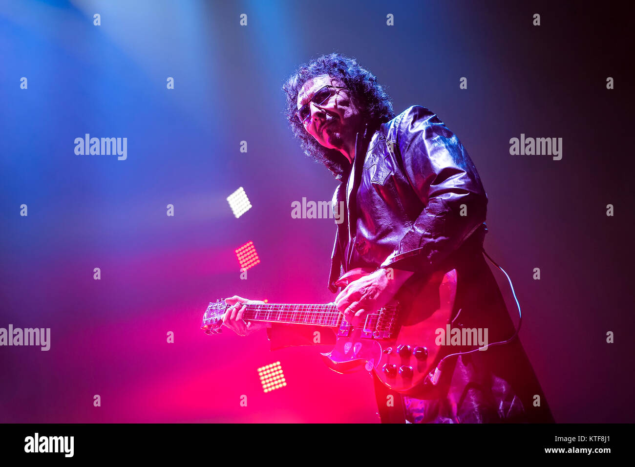 The English rock band Black Sabbath performs a live concert at Telenor Arena in Oslo. Here musician Tony Iommi on guitar is seen live on stage. Norway, 24/11 2013. Stock Photo