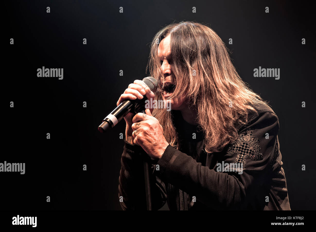 The English rock band Black Sabbath performs a live concert at Telenor Arena in Oslo. Here singer and TV-celebrity Ozzy Osbourne is seen live on stage. Norway, 24/11 2013. Stock Photo