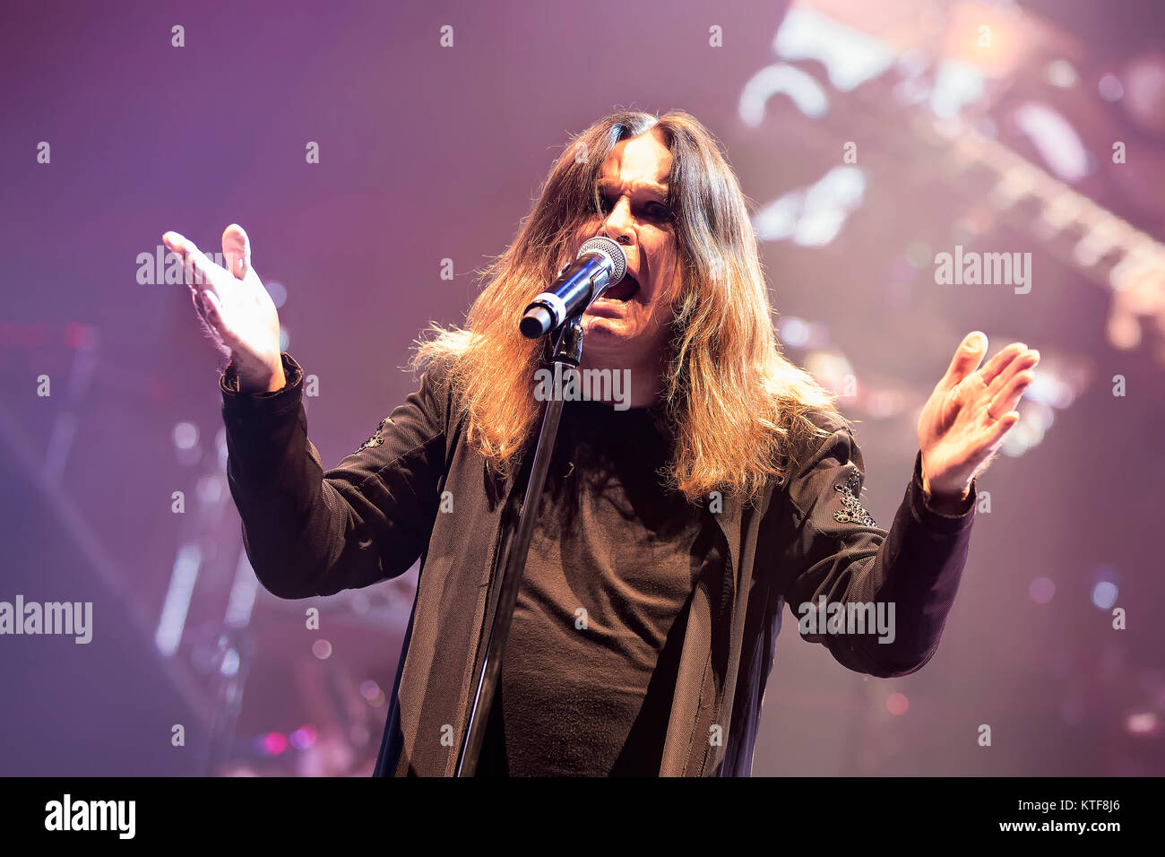 The English rock band Black Sabbath performs a live concert at Telenor Arena in Oslo. Here singer and TV-celebrity Ozzy Osbourne is seen live on stage. Norway, 24/11 2013. Stock Photo