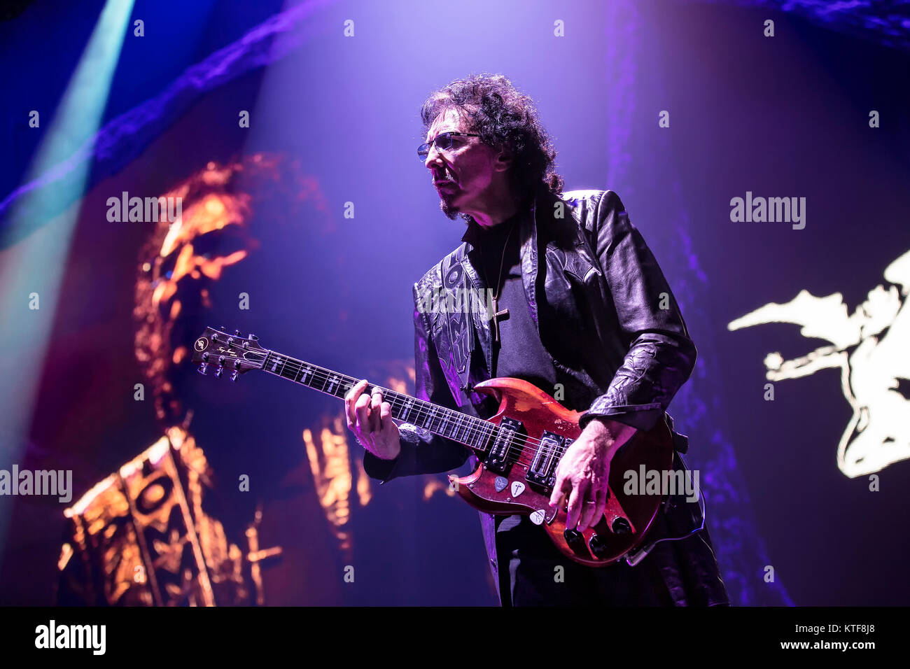 The English rock band Black Sabbath performs a live concert at Telenor Arena in Oslo. Here musician Tony Iommi on guitar is seen live on stage. Norway, 24/11 2013. Stock Photo