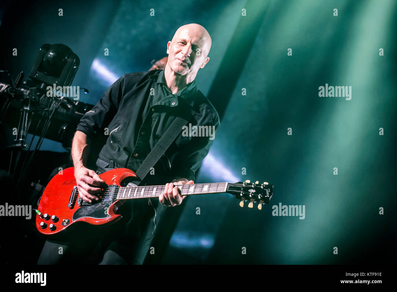 The English musician and composer David Rhodes on guitar performs with
