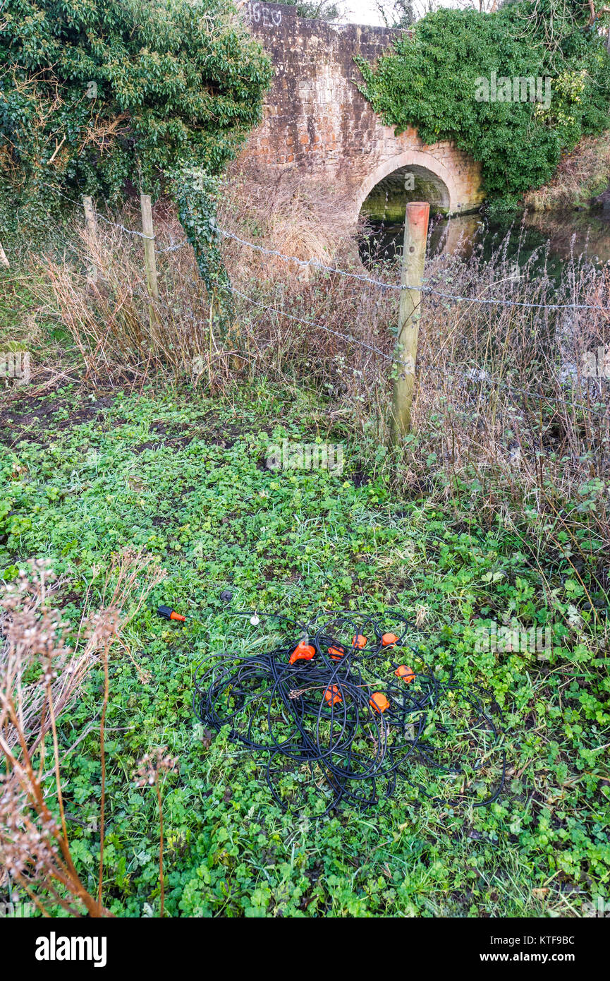 Seismic geophones and recording units at the side of a river. Stock Photo