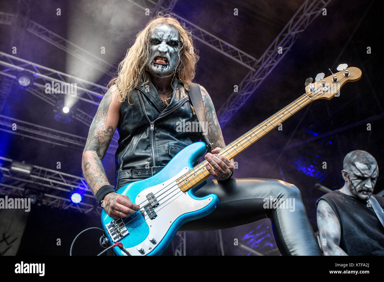 Norway, Borre – August 18, 2017. The Norwegian black metal band Gaahls Wyrd performs a live concert during the Norwegian metal festival Midgardsblot Festival 2017 in Borre. Here here bass player Frode Kilvik aka Eld is seen live on stage. (Photocredit: Terje Dokken). Stock Photo