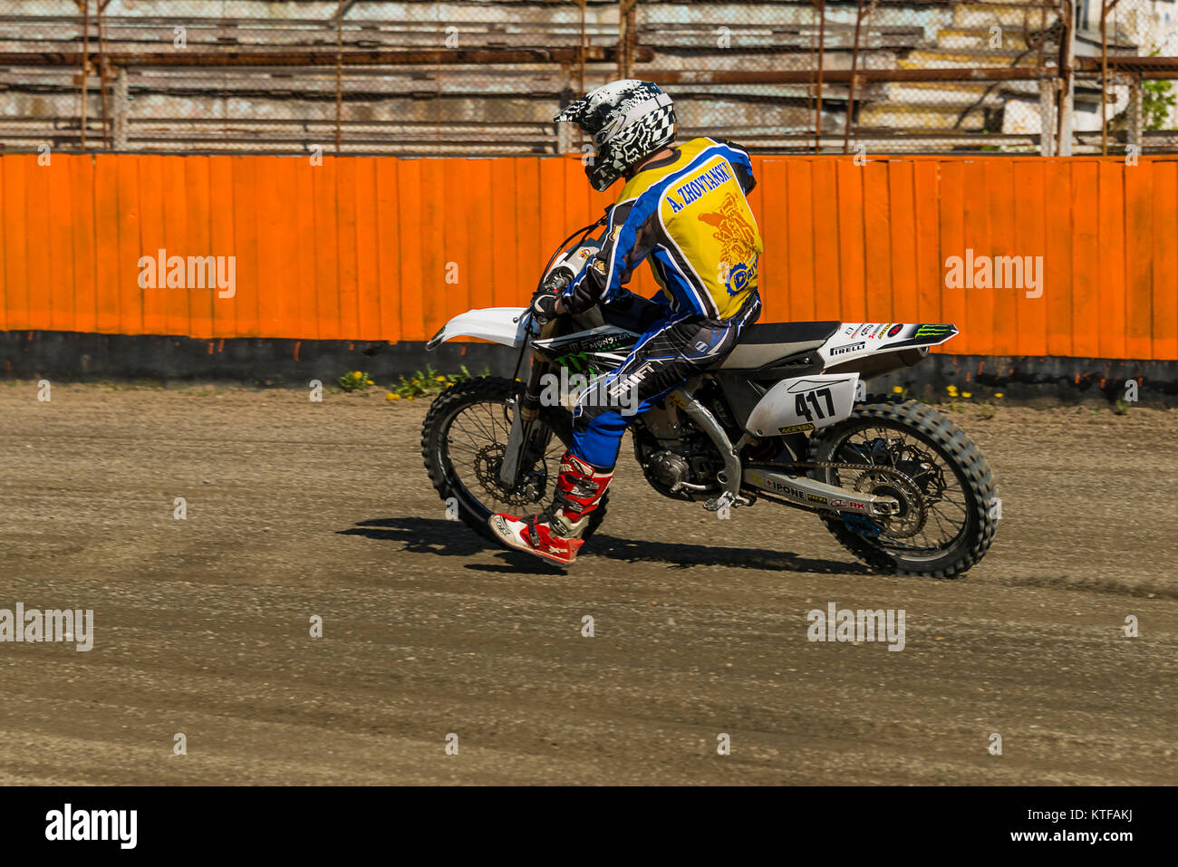 Lviv, Ukraine - 17 April 2016: Unknown rider overcomes the track at the  Flat Track  National Championship  to the Lviv city Stock Photo